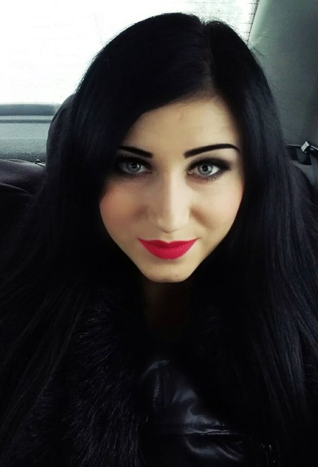Selfie of dark hair hottie's face