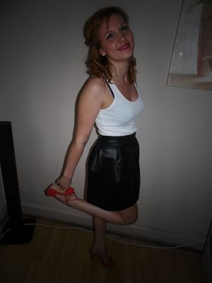 Cute dolled up redhead chick ready for the party