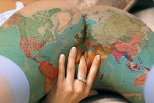 Woman exploring the globe