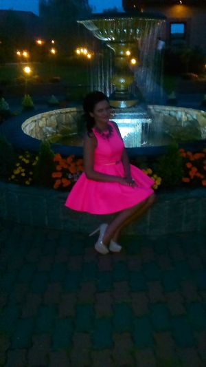 Brunette bimbo in pink dress