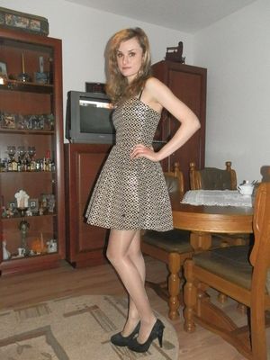 Blonde rookie wearing nice mini dress, nylons and heels