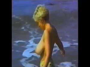 4882407 Danni Ashe On The Beach Showing Off Her Tan Lines