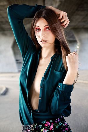 Model posing under the bridge