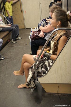 Barefoot in the subway metro