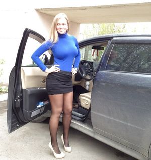 Busty mom by her family van
