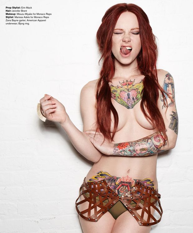 Tattooed redhead Hattie Watson posing