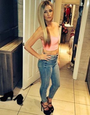 Blonde bimbo before going out