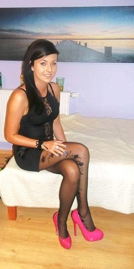 Sexy brunette in tight slutty mini dress and pink heels