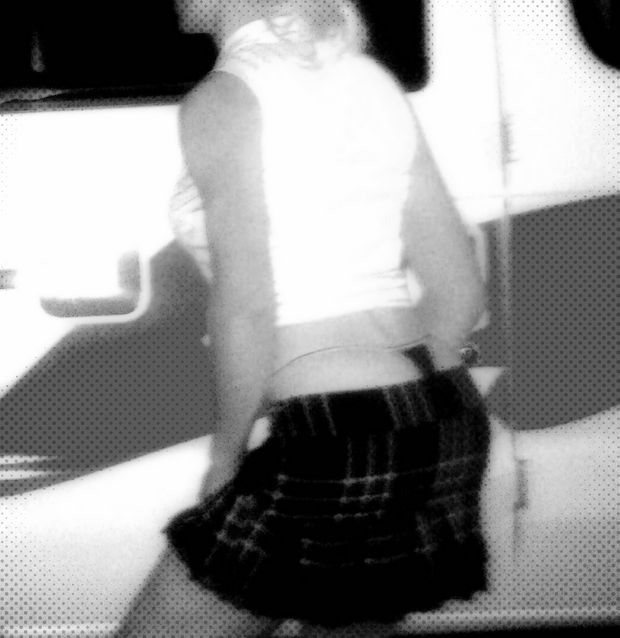 Young teen posing in a skirt!