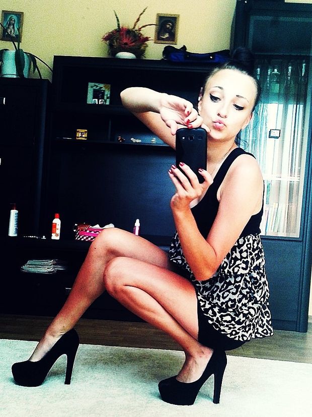 Duck face selfie at home