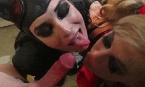 Harley Quinn and Catwoman cum kissing in parody