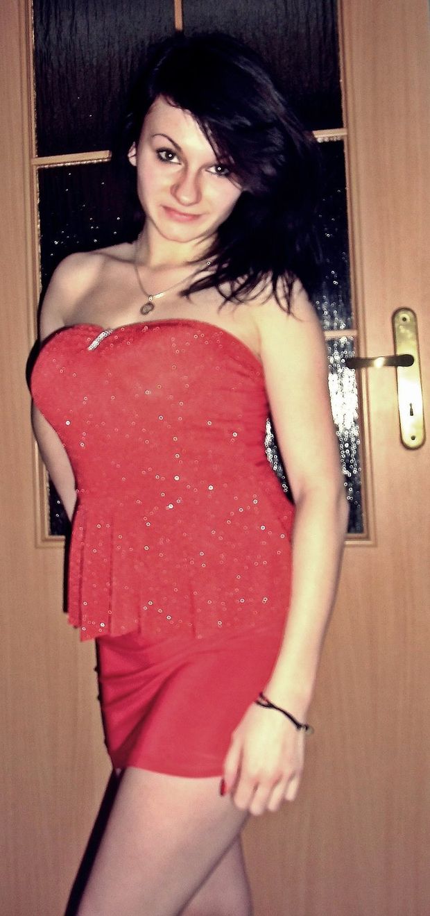 Dark hair rookie in a red dress