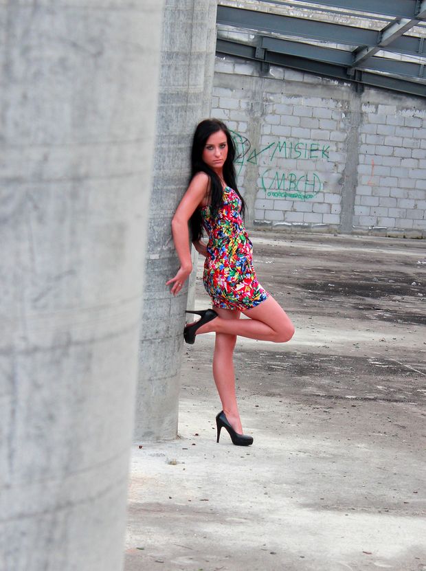 Nice brunette posing outdoors