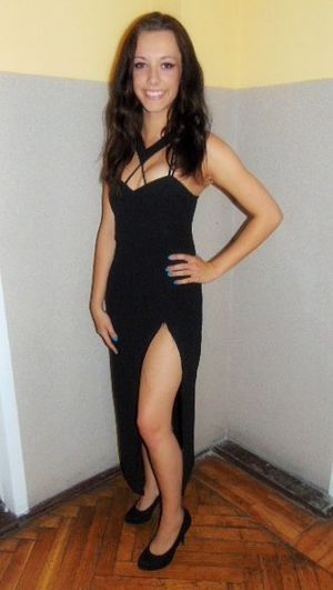 Nice brunette in black evening dress