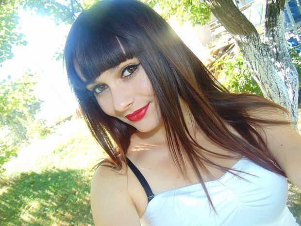 Dolled up brunette outdoors