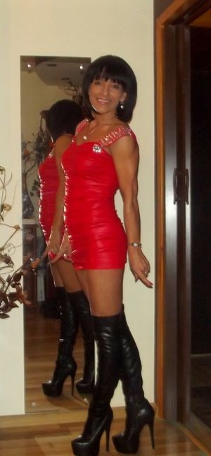 Tanned mature bimbo before going out