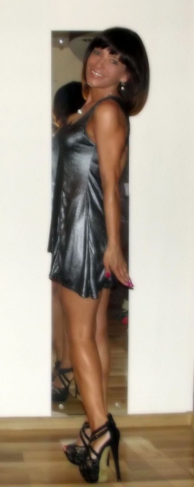 Incredibile sexy and leggy milf in shiny micro dress and sexy black high heels