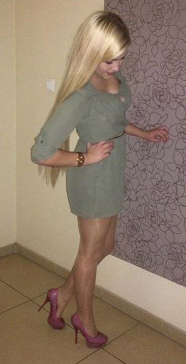 Cute blonde rookie posing at home