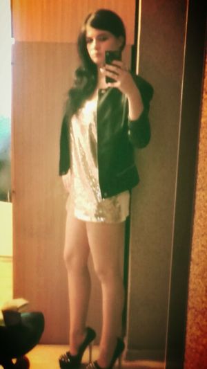 Quick selfie before going out in really mini dress, high heels and leather jacket