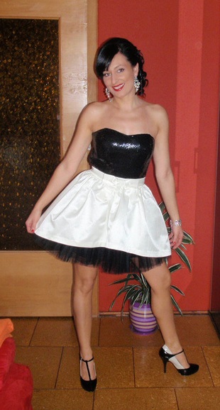 Nice brunette in sexy party outfit posing for some pic before going out
