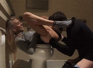 Blonde eaten out on toilet