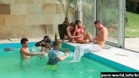 Bisexual couple has interracial groupsex poolside