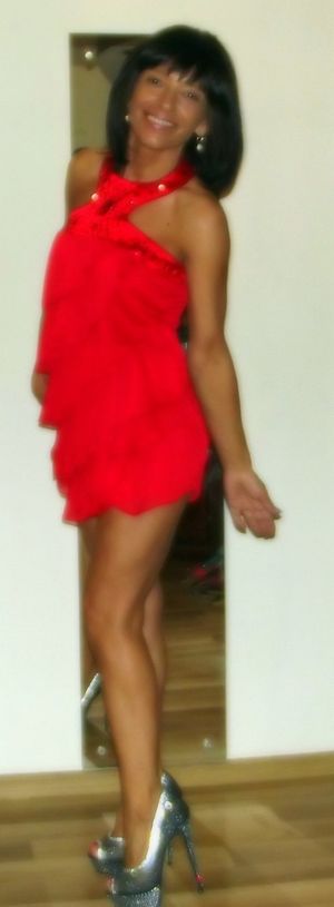 Leggy milf in sexy red mini dress