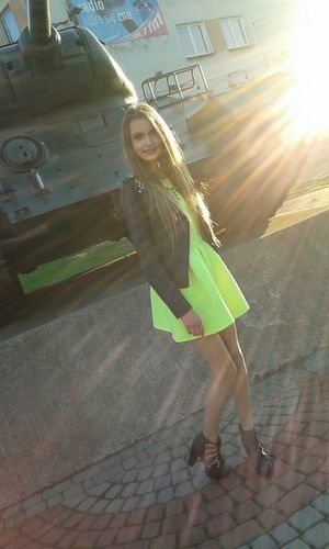 Nicely dressed rookie posing outdoors