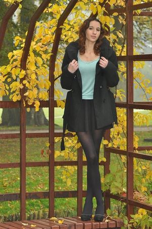 Brunette posing in the park