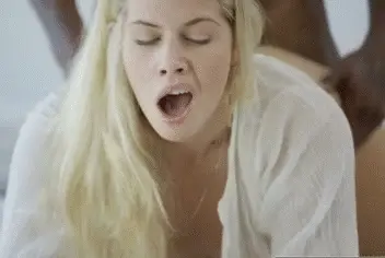 Blonde fucked from behind by black guy