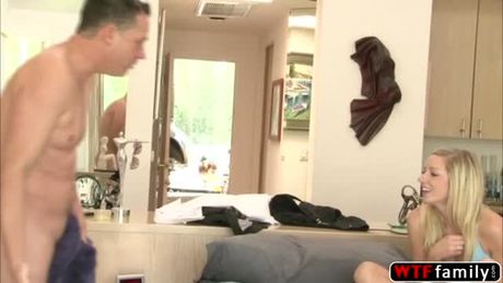 Gorgeous hot blonde Kylee Reese is listening to a music with headphone on when she enter enters her stepmom room.