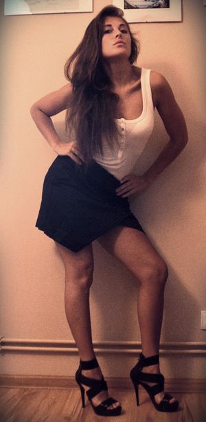 Brunette rookie posing at home