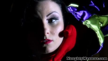 Tattooed deepthroating babe fucked by a clown