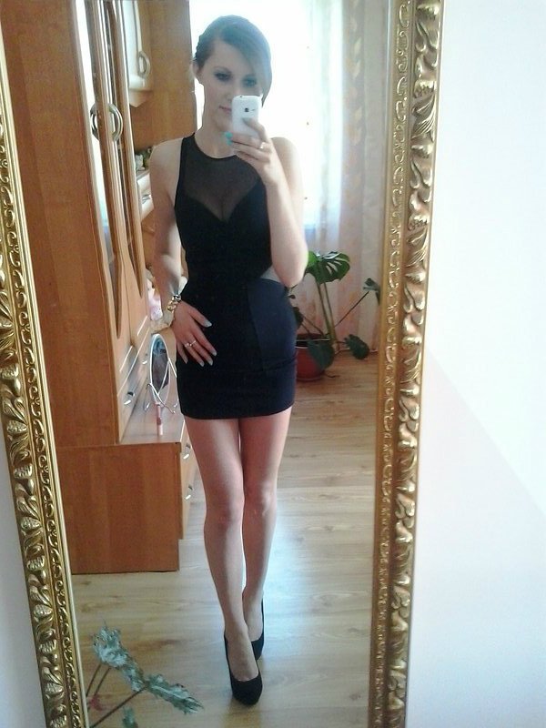 Taking a selfie in new party dress
