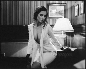 Incredibly sensual brunette on black and white photo