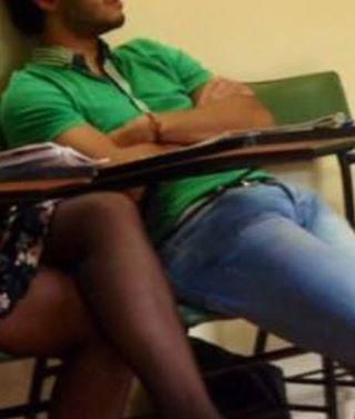 that's hot!  stud with a huge bulge and a nice pair of legs in black nylons!