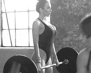 Hot chick lifting weights