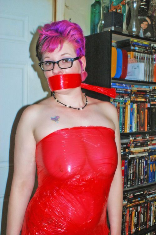red saran wrap dress and gag