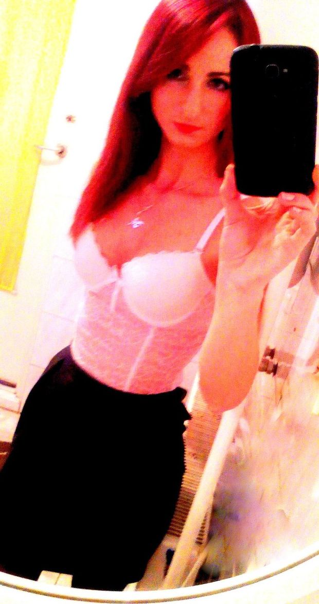 Redhead chick taking some lingerie selfie