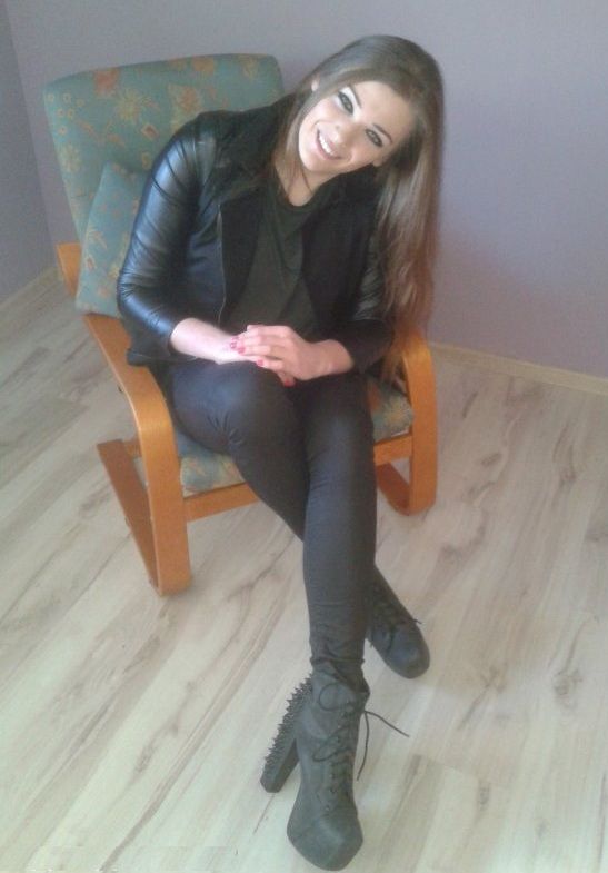 Nice brunette in leather outfit