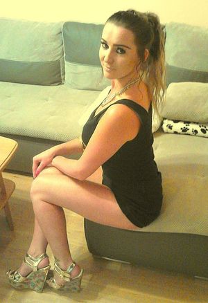 Busty bimbo at the party in so damm short black dress ...