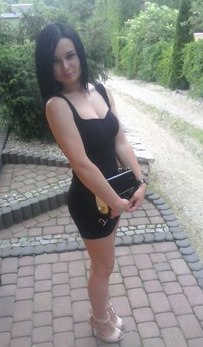 Cute busty chick in tight mini dress outdoors