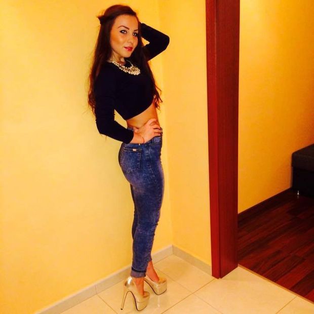 Sexy chick before night out posing in her new golden heels