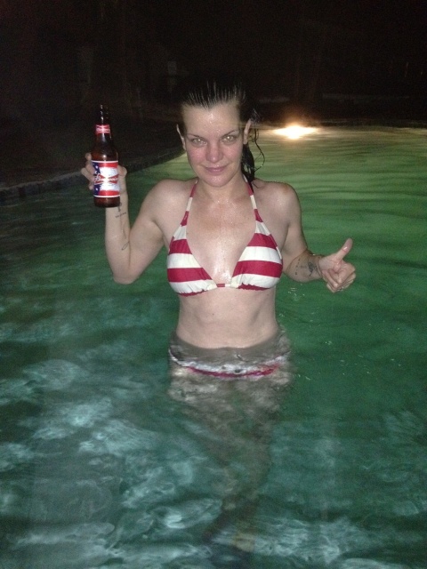 Pauley Perrette in a bikini in a pool