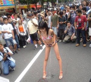 peeing in front of a crowd