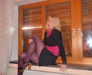 Nice blonde sexy wife posing