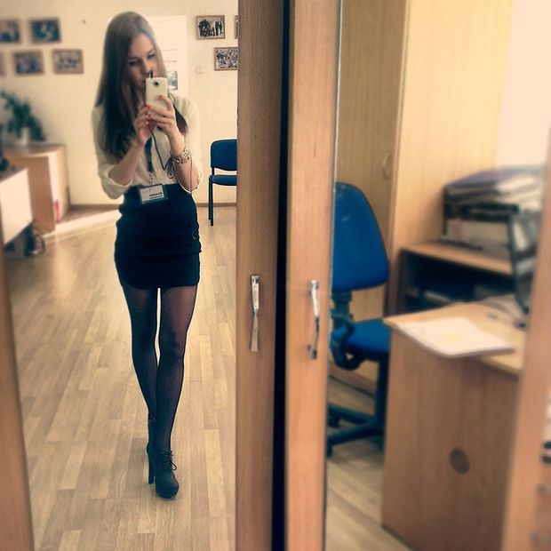 thin secretary takes a selfie