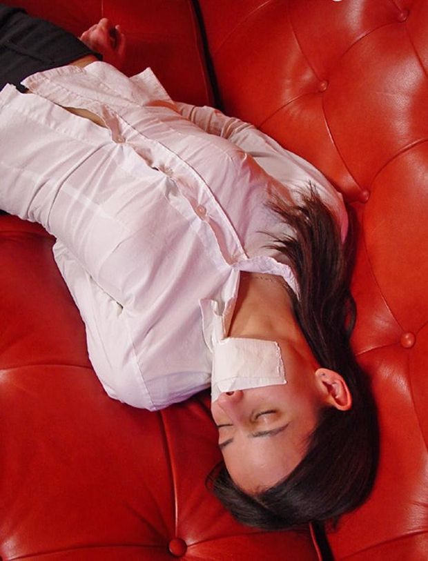 hottie bound and gagged unconscious on sofa