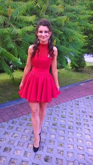 Nice brunette babe in red mini dress