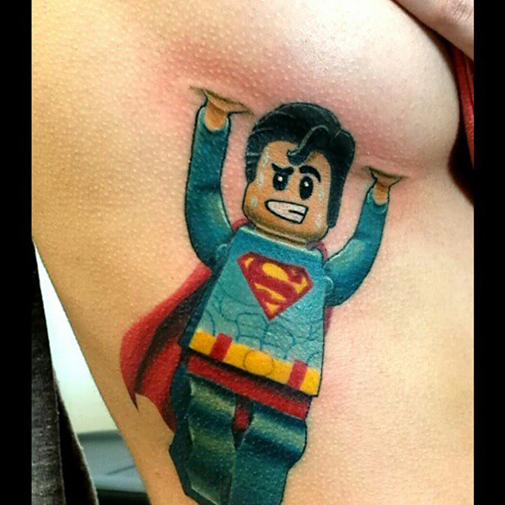 Lego Superman doing the work of Atlas